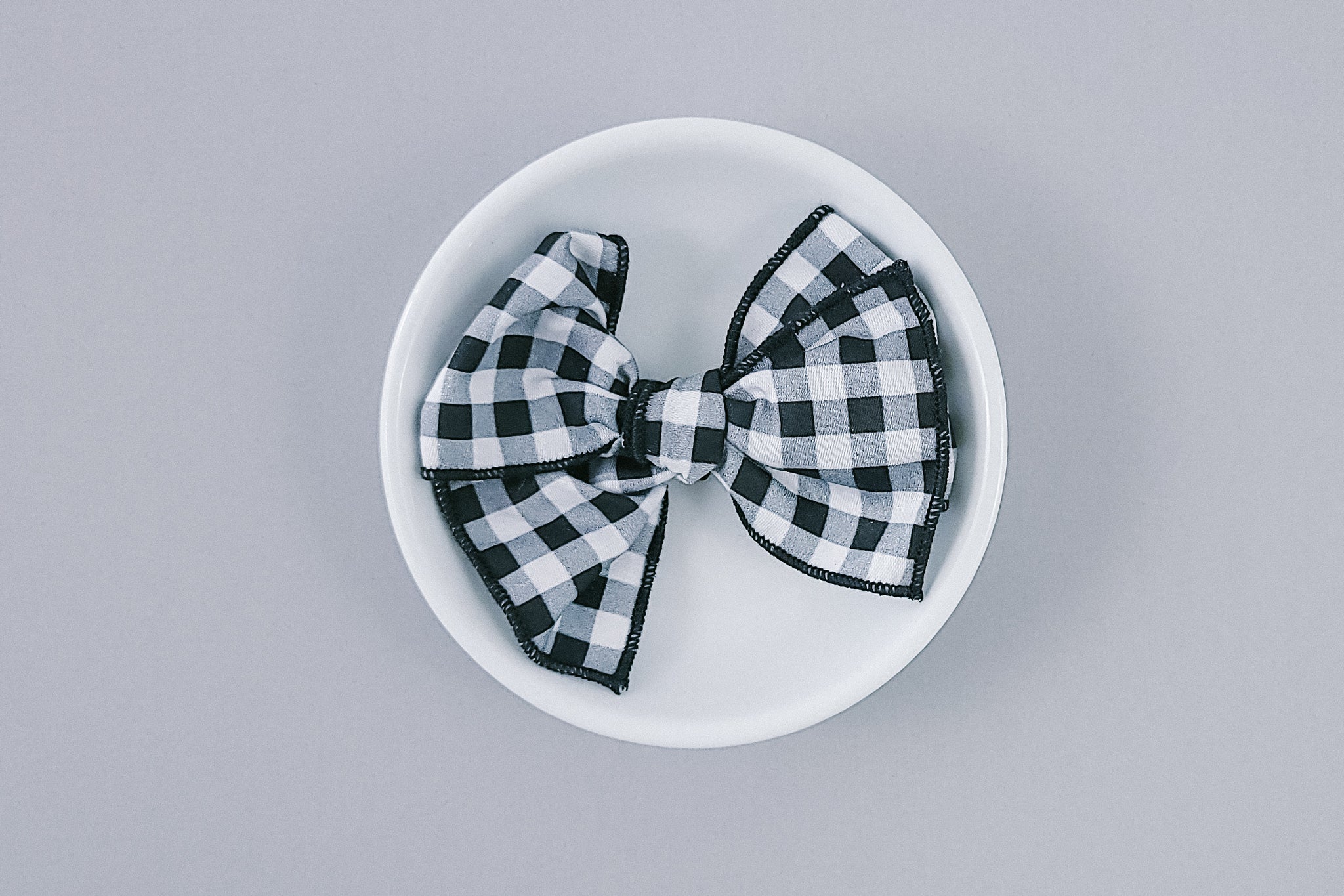 Serged Edge Pinwheel Bow | Charcoal Gingham